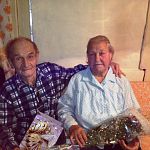 В Парфинском районе поздравили с 60-летием со дня свадьбы чету Пановых
