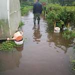 Проливной дождь затопил частный сектор в Холмском районе