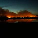 Новгородцы вместе с МЧС более пяти часов тушили пожар на поле рядом с Ращепом 