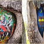 Чудовские художники красочно оформили дупла деревьев в местном парке 
